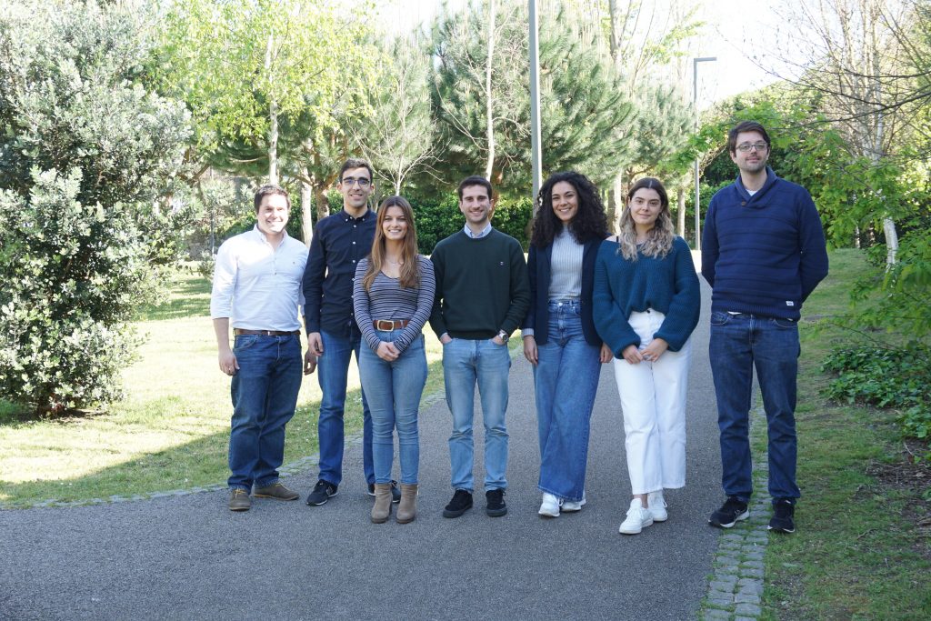A team of data scientists in a garden